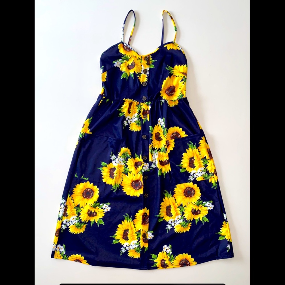 Beautiful sunflower summer dress! Never worn and in great condition.